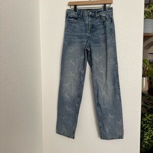 High Waisted Light Wash Denim with All-Over Bow Print